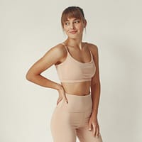 Activewear model wearing sports bra and leggings