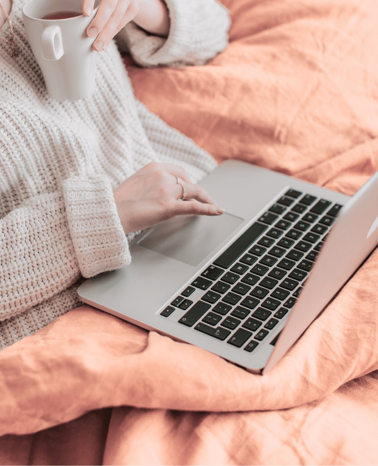 SEO using laptop in bed